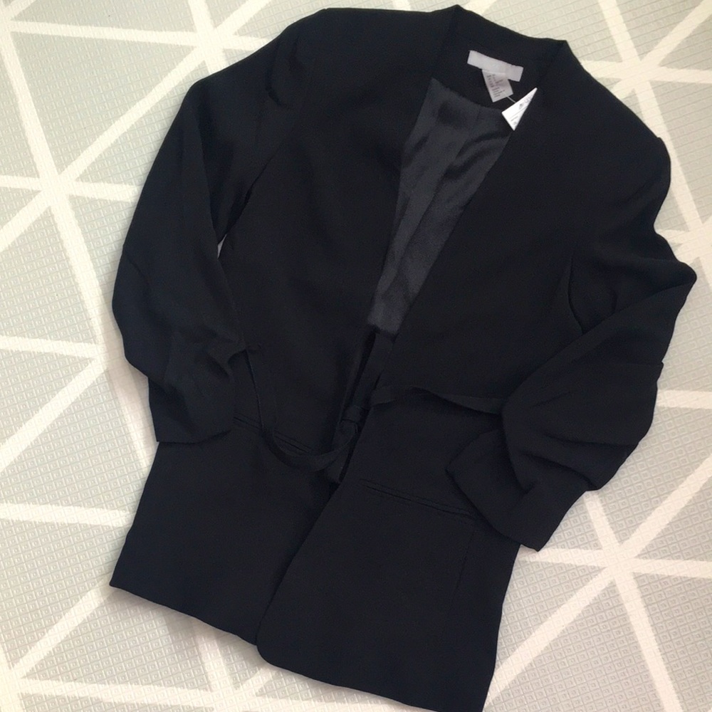 NWT H&M chic black blazer with front string tie. Size 0.